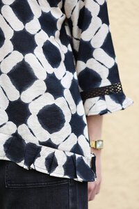 Oddly Polite Pleated Pony Top