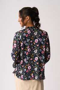 Foil Ruffle Neck Scoop Hem Top